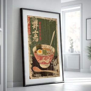May include: Vintage style poster featuring a bowl of ramen noodles with a soft boiled egg, seaweed, and chopsticks. The poster has a green and brown background with Japanese text that reads "Ramen".