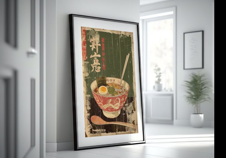 May include: Vintage style poster featuring a bowl of ramen noodles with a soft boiled egg, seaweed, and chopsticks. The poster has a green and brown background with Japanese text that reads "Ramen".