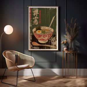 May include: A vintage-style poster featuring a bowl of ramen with a green background and Japanese text. The poster has a distressed, aged look.