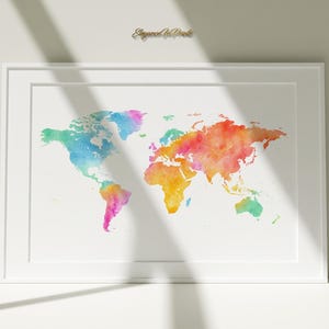 May include: A watercolor world map with a white background. The continents are painted in shades of blue, green, orange, yellow, and pink.