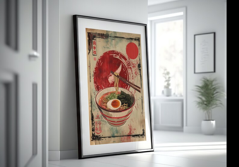 May include: A vintage-style poster featuring a bowl of ramen with chopsticks, a red circle, and Japanese text. The poster has a distressed, aged look.