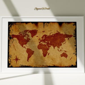 May include: A vintage-style world map print with a red, brown, and beige color scheme. The map is framed in a white frame and has a compass rose in the bottom left corner.