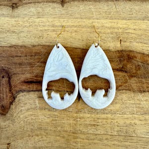 Hollow bison teardrop earrings | polymer clay + stainless steel