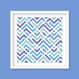 May include: A framed cross-stitch pattern with a geometric design of blue, purple, and green zigzags.