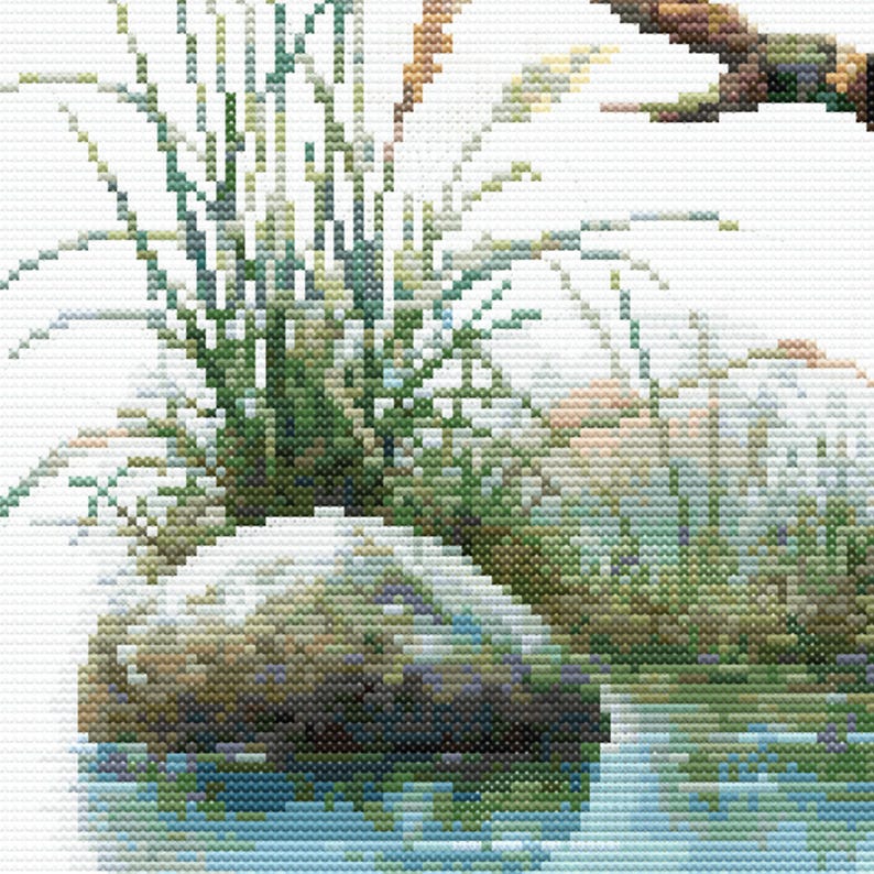Close-up of Sacred Kingfisher Kōtare Cross Stitch Pattern showing reeds, water, rocks, and natural New Zealand wetland detail.
