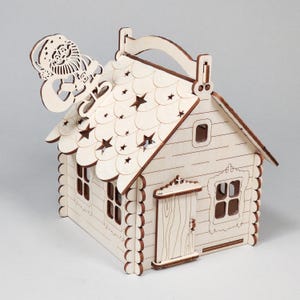 Boîte de bonbons de Noël, maison avec étoiles coupées sur le toit et porte-oeufs 3,18 mm 0,125 pouce 1/8 contreplaqué prêt à être découpé aux formats SVG, LBRN2, DXF, AI