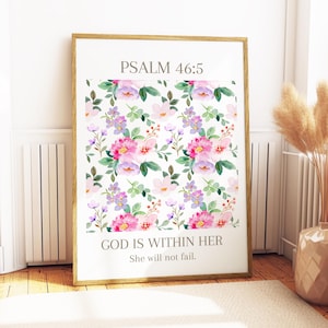 Może przedstawiać: Oprawiony wydruk artystyczny z kwiatowym wzorem różowych, fioletowych i białych kwiatów z zielonymi liśćmi. Tekst "PSALM 46:5" znajduje się na górze, a "GOD IS WITHIN HER, She will not fail." na dole. Złota rama.