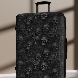Black Flowers and Skulls Suitcase! Hard side, rolling luggage with black skulls and flowers.Gothic, Skulls, black luggage!  Skull suitcase!