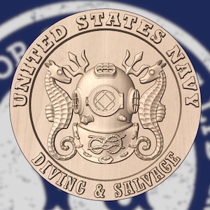 May include: A wooden plaque featuring the words "UNITED STATES NAVY DIVING & SALVAGE" in a circular design. The design includes a diving helmet, seahorses, and a trident. The plaque is light brown in color.