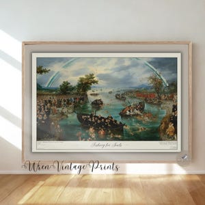 May include: Framed vintage print of a historical scene with boats on a river, people on the banks, and a rainbow in the sky. The print is in a light wood frame and is displayed on a wall above a wooden floor.