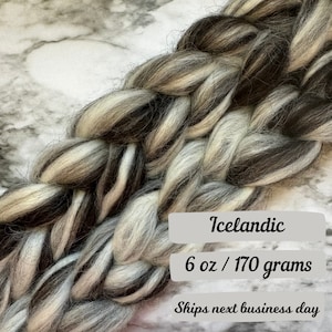May include: A braid of Icelandic wool yarn in black and white. The yarn is 6 ounces or 170 grams.