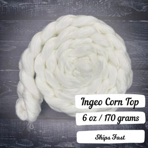 May include: A large, coiled bundle of white Ingeo Corn Top fiber, weighing 6 oz (170 grams). The text "Ingeo Corn Top" and "6 oz / 170 grams" are visible on a white rectangular label. The label also says "Ships Fast".