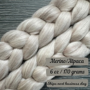 May include: A braid of light beige merino and alpaca fiber, weighing 6 ounces or 170 grams.