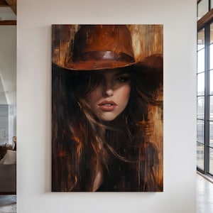 Sztuka ścienna „Kowbojka” na płótnie | Rustykalny portret kobiety z Zachodu w brązowym kapeluszu | Kobiecy wystrój domu w stylu wiejskim | Wydruk w stylu vintage z obrazem olejnym