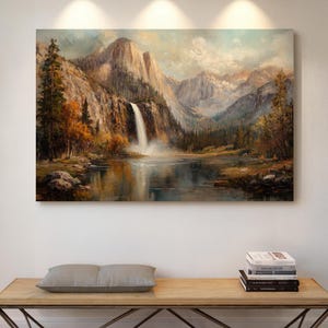 Majestic Waterfall Flowing Through Mountainous Landscape with Vibrant Autumn Trees and Calm River Reflection