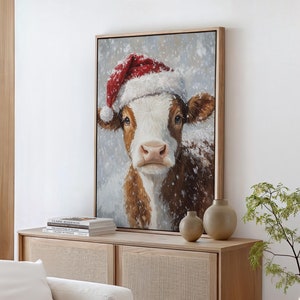 Festive Cow Wall Art - Rustic Santa Hat Christmas Canvas - Farmhouse Holiday Decor - Snowy Winter Animal Portrait for Cozy Charm
