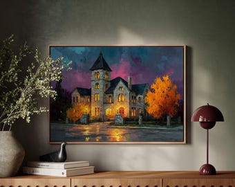 May include: A framed painting depicts a stone house with a tower, illuminated windows, and a vibrant autumn tree. The sky transitions from purple to blue. The artwork is displayed above a wooden cabinet with a vase, books, a bird sculpture, and a burgundy table lamp.