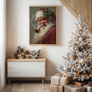 May include: A framed vintage portrait of Santa Claus smoking a pipe, wearing a red coat and hat with holly. The image is displayed above a wooden cabinet with Christmas decorations and a flocked Christmas tree with ornaments and wrapped gifts.