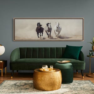 A breathtaking panoramic canvas of three powerful stallions galloping through the desert, their strength and grace captured in motion. Perfect for equestrian, western, or farmhouse decor