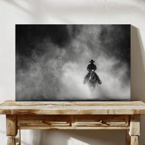 Cowboy Riding Through Dust | Western Black and White Wall Art