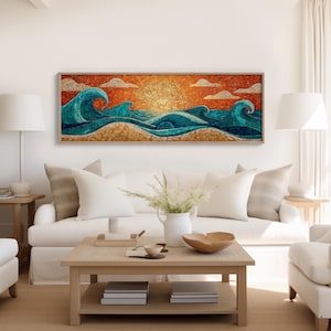 May include: A rectangular framed mosaic artwork showing a seascape with turquoise waves, a golden sun, and an orange sky. The mosaic is framed in light wood and hangs above a white sofa. The artwork evokes a sense of the ocean and beach.