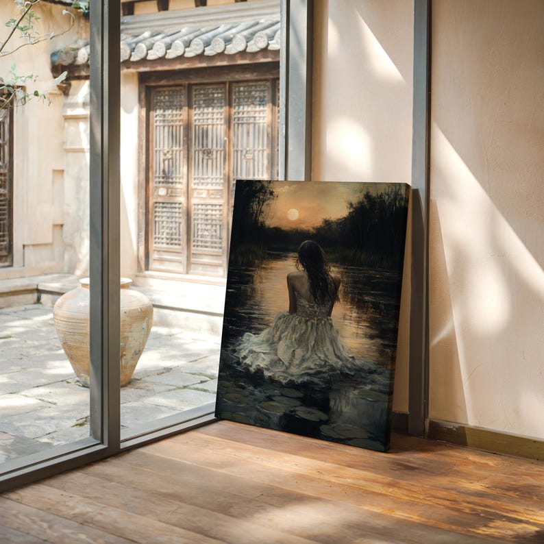 May include: A painting of a woman in a white dress sitting in a lake with lily pads. The sun is setting in the background, and the water is reflecting the light.