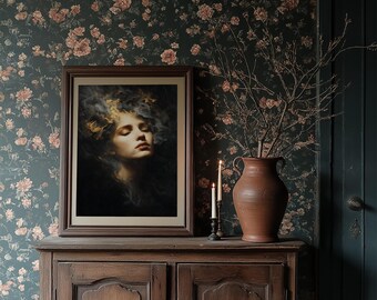 May include: A framed portrait of a woman with closed eyes and wisps of smoke around her head rests on a wooden cabinet. Two lit candles and a terracotta vase with branches are also on the cabinet. The background features floral wallpaper.