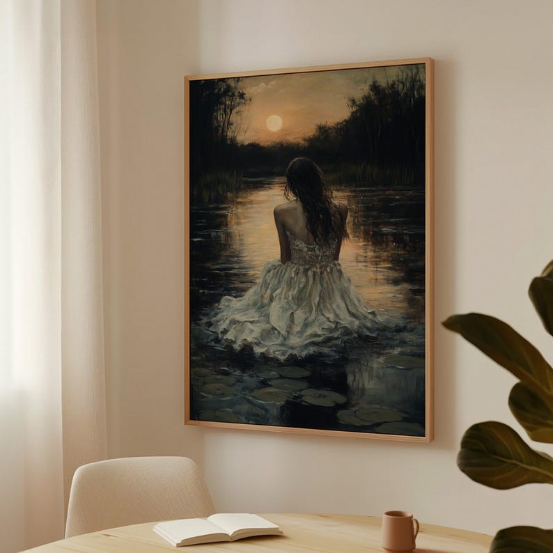 This serene canvas art captures a woman in a vintage lace gown by a moonlit lake with water lilies, evoking romance and nostalgia. Perfect for adding a dreamy, poetic touch to your space, this piece blends soft elegance with tranquil nature landscape