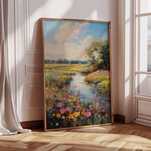 May include: A painting of a landscape with a river flowing through a field of wildflowers. The sky is blue with white clouds and the sun is shining. The flowers are in shades of pink, yellow, and purple.