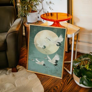 Japanese Crane Wall Art – Flying Red-Crowned Cranes Against Full Moon on Teal Background Canvas Print