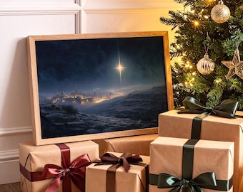 May include: A framed print depicting a celestial scene with a bright star over a city, resting on wrapped gifts with satin ribbons. A decorated Christmas tree with ornaments and lights is in the background.