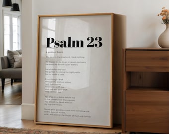 Puede incluir: Un cuadro enmarcado con el texto del Salmo 23. El título "Psalm 23" está en negrita, con una fuente sans-serif, con los versículos debajo en una fuente más pequeña y legible. El marco es de color madera clara.
