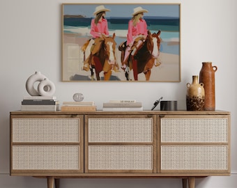 Dipinto di cowgirl a cavallo sulla spiaggia
