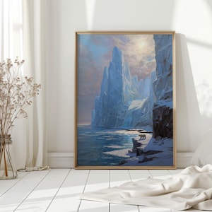May include: A framed landscape painting depicts a polar bear on a snowy shoreline, with towering blue ice formations and a serene, icy sea under a soft, cloudy sky. The artwork is in a wooden frame.