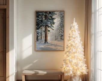 Puede incluir: Una escena de bosque invernal enmarcada con árboles cubiertos de nieve cuelga sobre un banco beige. Un árbol de Navidad blanco e iluminado se encuentra a la derecha, junto a una ventana con cortinas transparentes. La habitación tiene un ambiente cálido y acogedor.