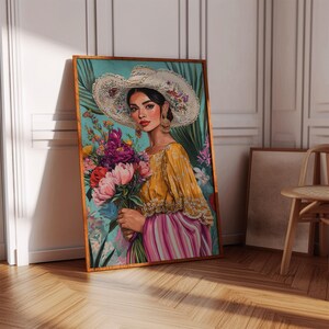 May include: A framed art print depicting a woman in a yellow blouse and striped skirt, holding a bouquet of flowers. She wears a large white hat with floral accents and gold earrings. The background is a mix of turquoise and green.