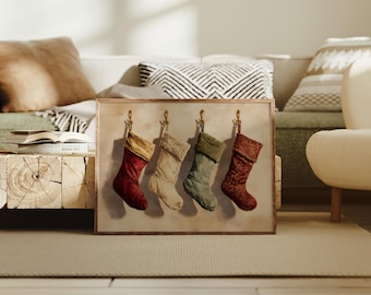 Lienzo decorativo vintage con medias navideñas, decoración rústica navideña, acogedor cuadro navideño de estilo rústico con medias rojas, verdes y blancas.