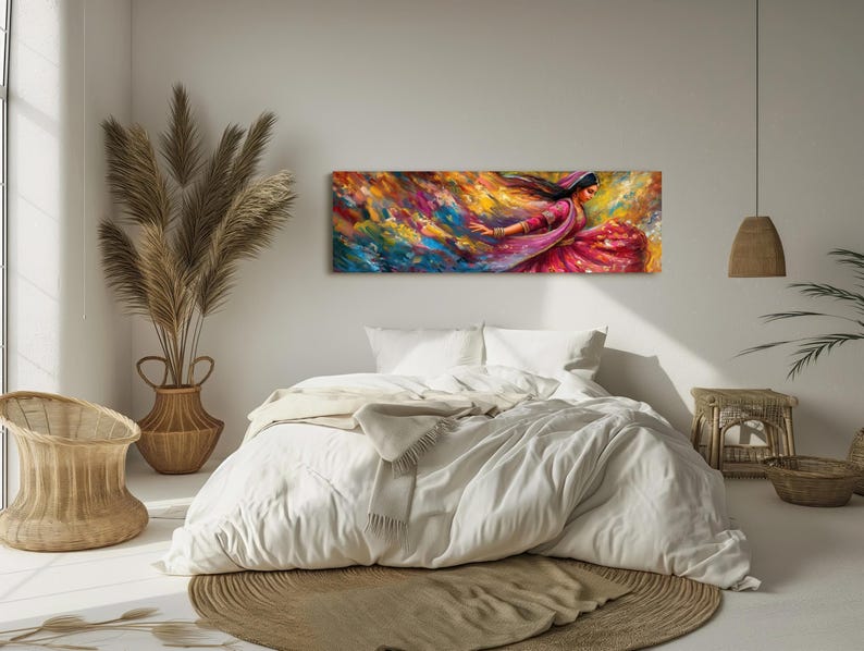 a bedroom with a large painting on the wall