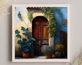 May include: A square framed wall art print depicting a dark brown arched wooden door set into a textured blue and cream wall. A large potted plant with broad leaves sits to the left, while climbing vines and small potted flowers adorn the entrance.