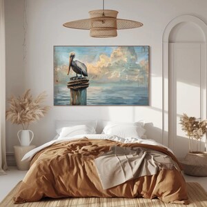 a painting of a pelican sitting on a post in a bedroom