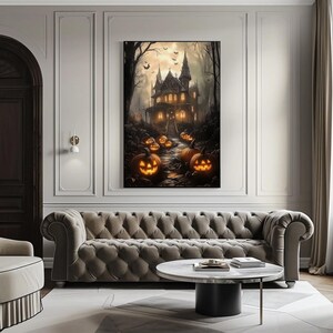 a living room filled with furniture and a painting on the wall