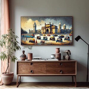 a painting hanging on a wall above a dresser