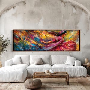 a living room with a large painting on the wall