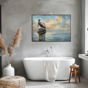 a bathroom with a tub and a painting on the wall