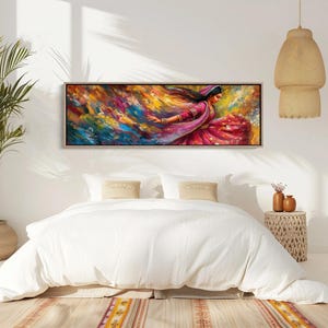 a bedroom with a large painting hanging above the bed