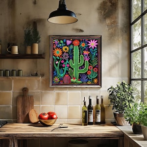 a picture of a cactus on a wall above a kitchen counter