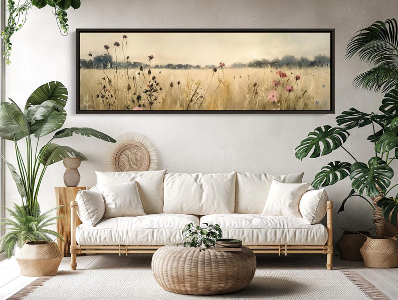 a living room with a couch and potted plants