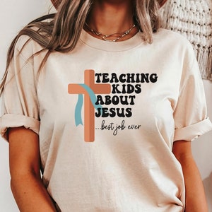 子供たちにイエスについて教える、ミニストリー シャツ、牧師シャツ、ユース牧師 T シャツ、子供ミニストリー T シャツ、教会シャツ、クリスチャン シャツ