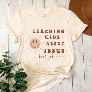 子供たちにイエスについて教える、ミニストリー シャツ、牧師シャツ、ユース牧師 T シャツ、子供ミニストリー T シャツ、教会シャツ、クリスチャン シャツ