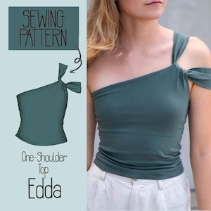 Könnte beinhalten: Ein dunkelblaugrünes One-Shoulder-Oberteil mit einem geknoteten Trägerdetail an einer Seite. Das Bild enthält eine grafische Darstellung des Kleidungsstücks mit der Aufschrift SEWING PATTERN, One-Shoulder Top und Edda, die das Design zeigt.